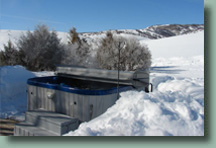 High Tide Ranch's Bunkhouse has an outdoor hot tub and woodburning fireplace